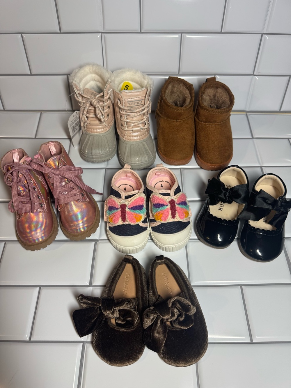 Lot of toddler girl's shoes